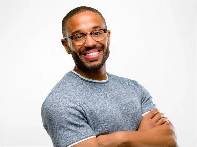 man smiling arms crossed