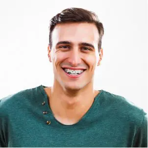 man with braces smiling