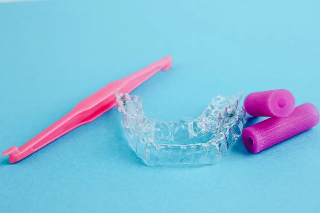 Transparent invisible dental aligners or braces applicable for an orthodontic dental treatment