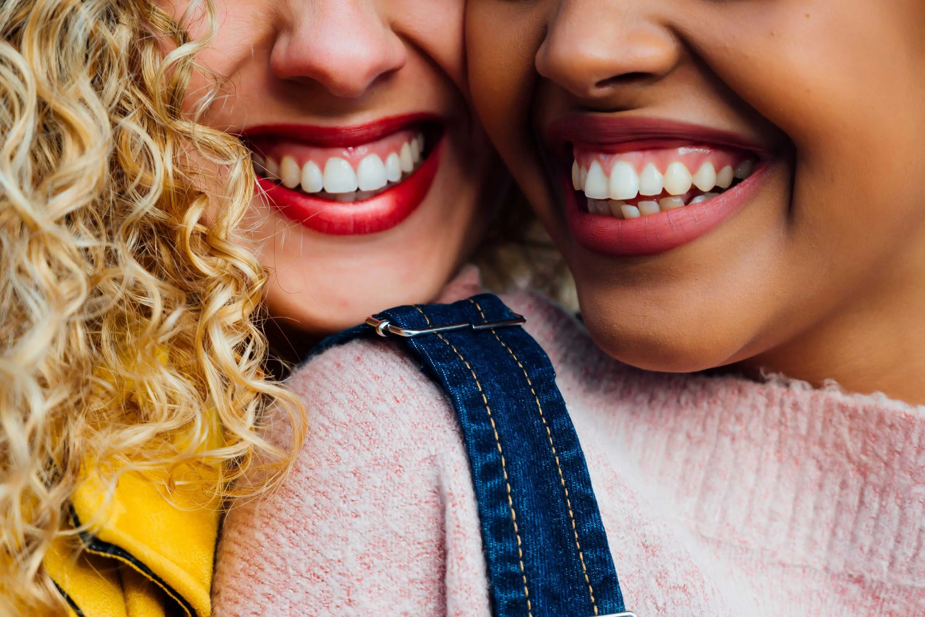 two beautiful women smiling
