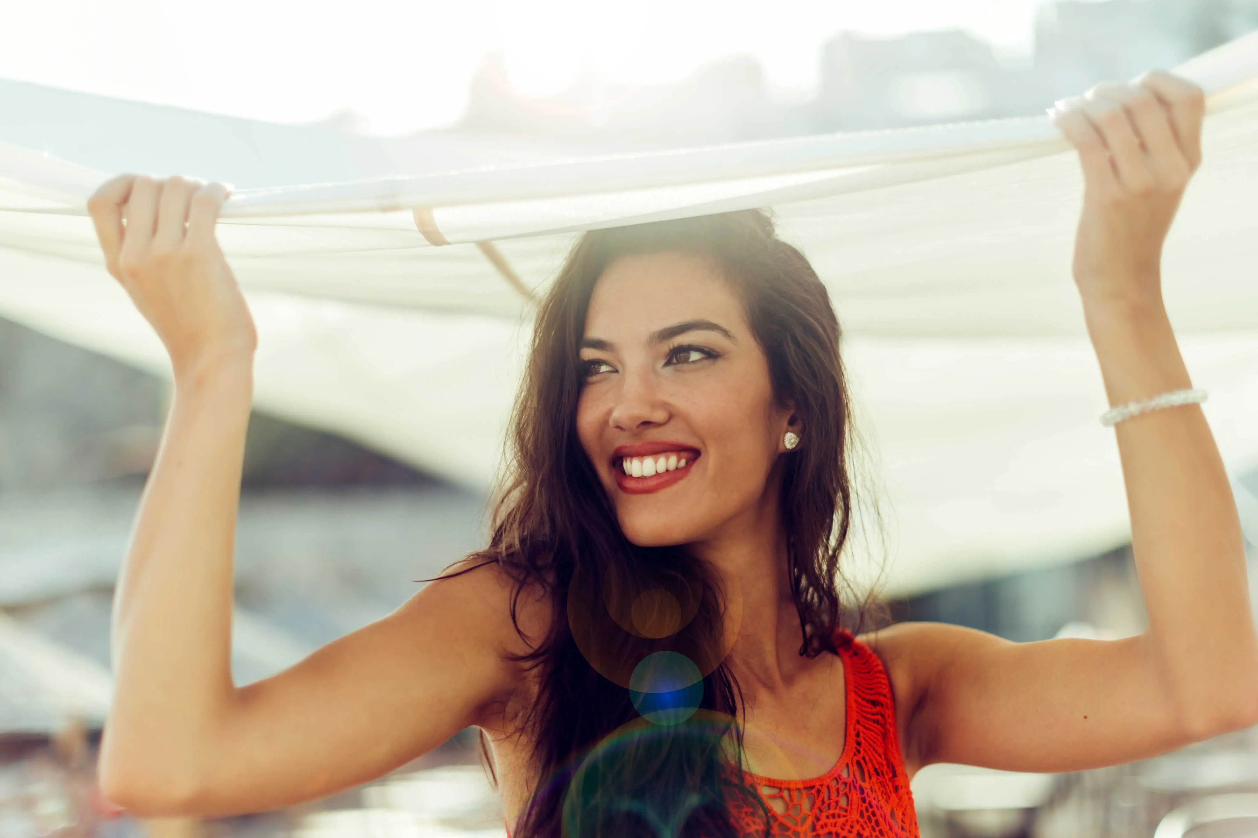 pretty woman holding white cloth