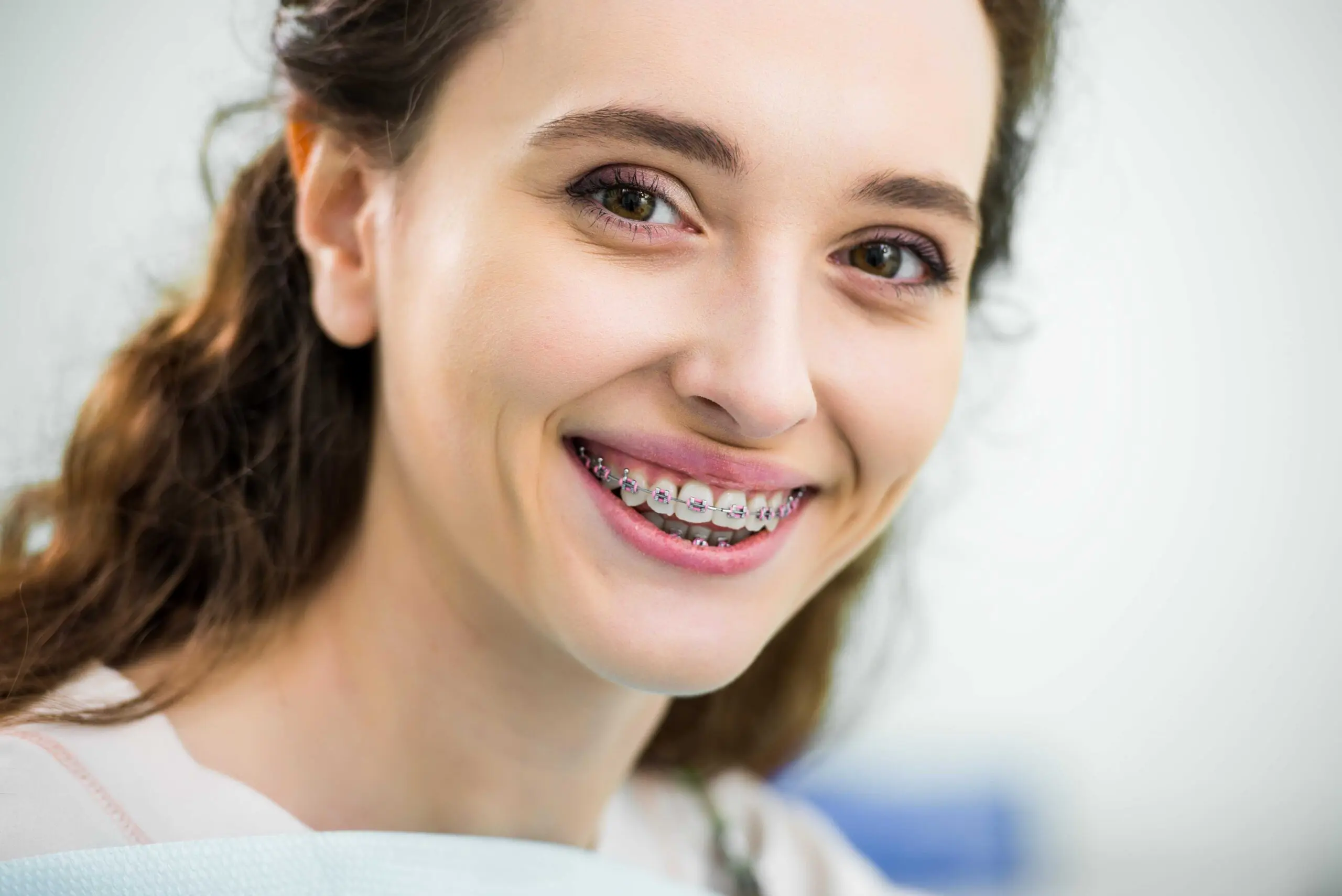 woman happily smiling at camera