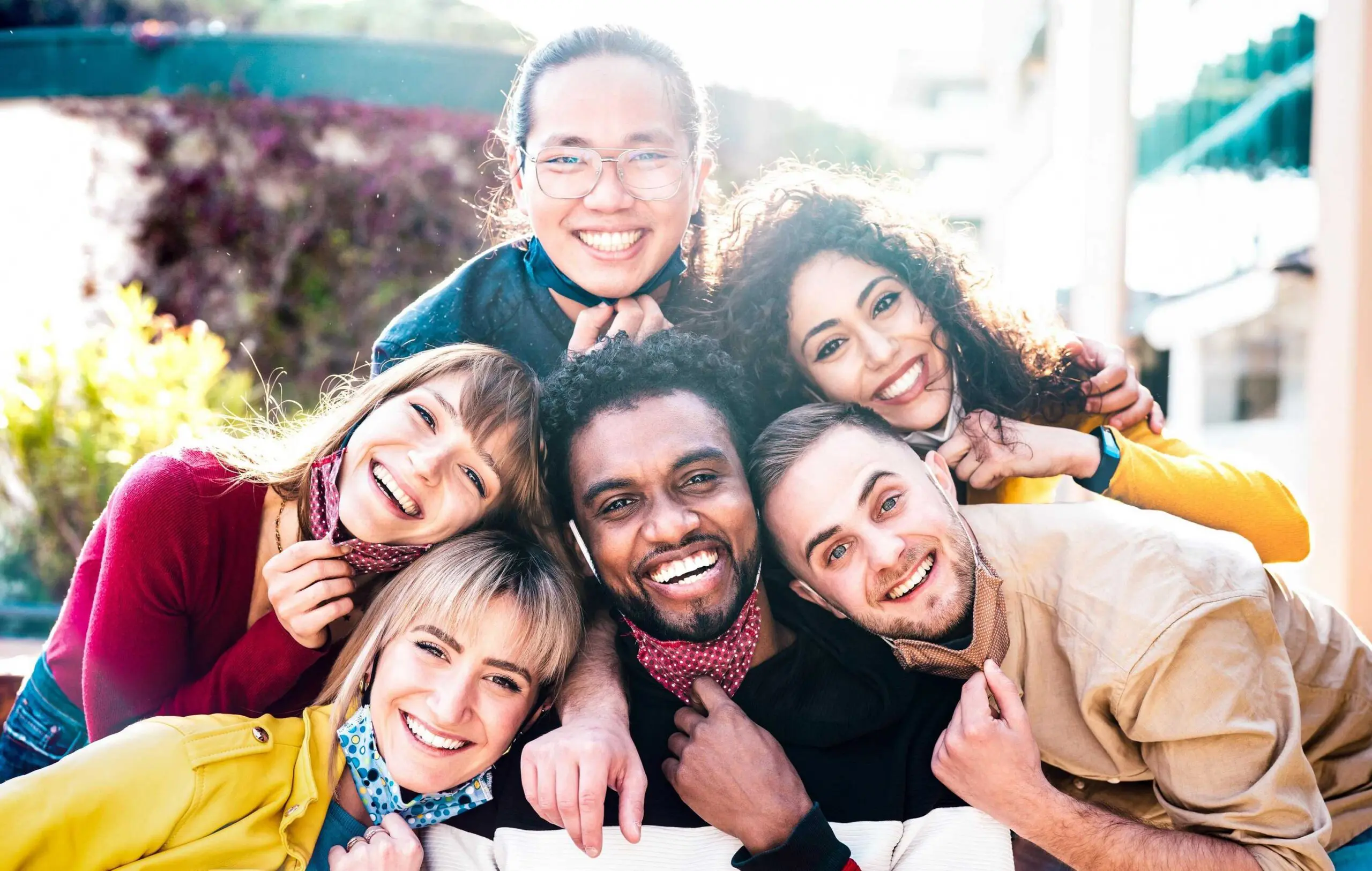 group of people taking a picture and smiling