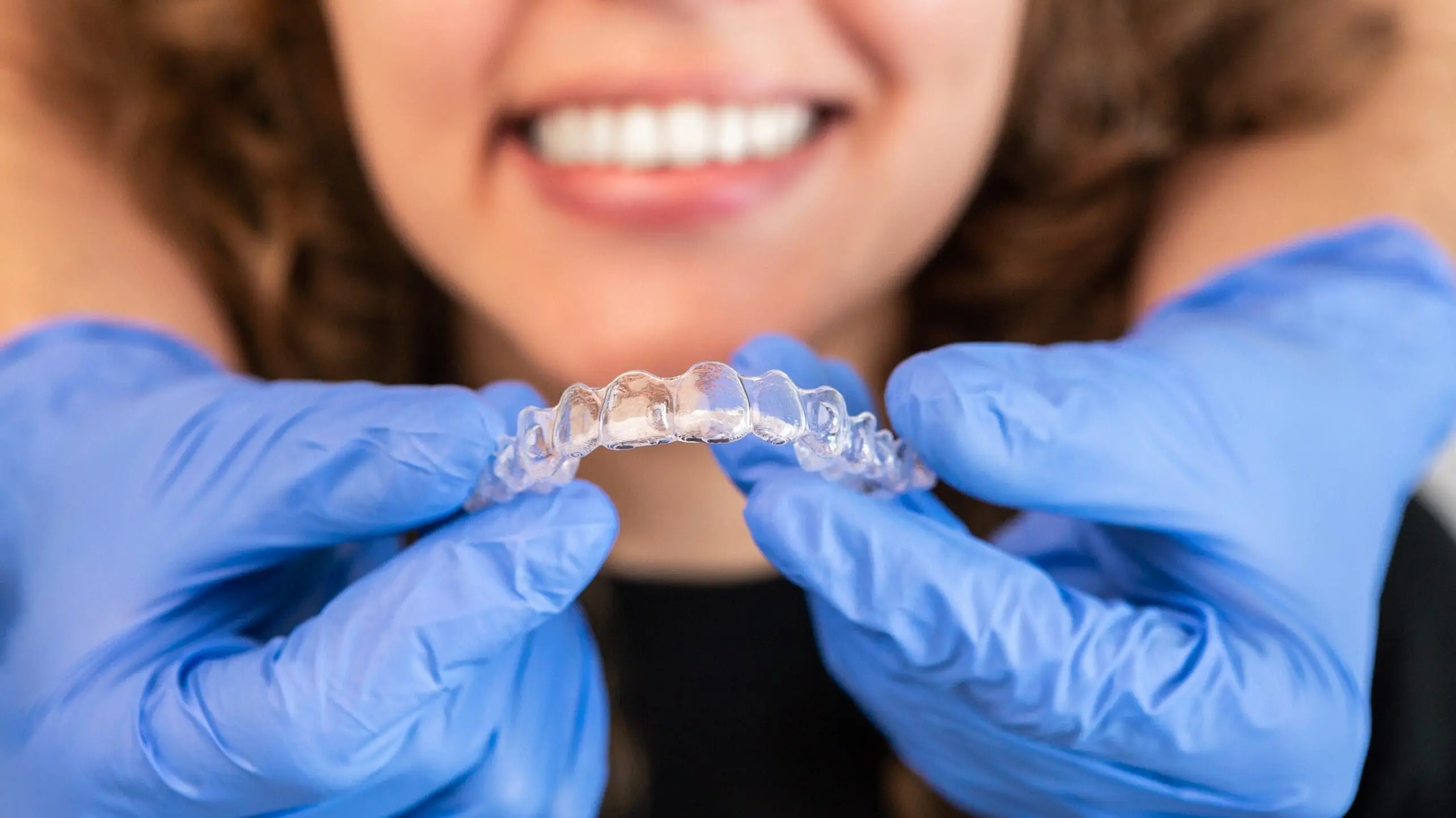 woman and dentist clear aligners