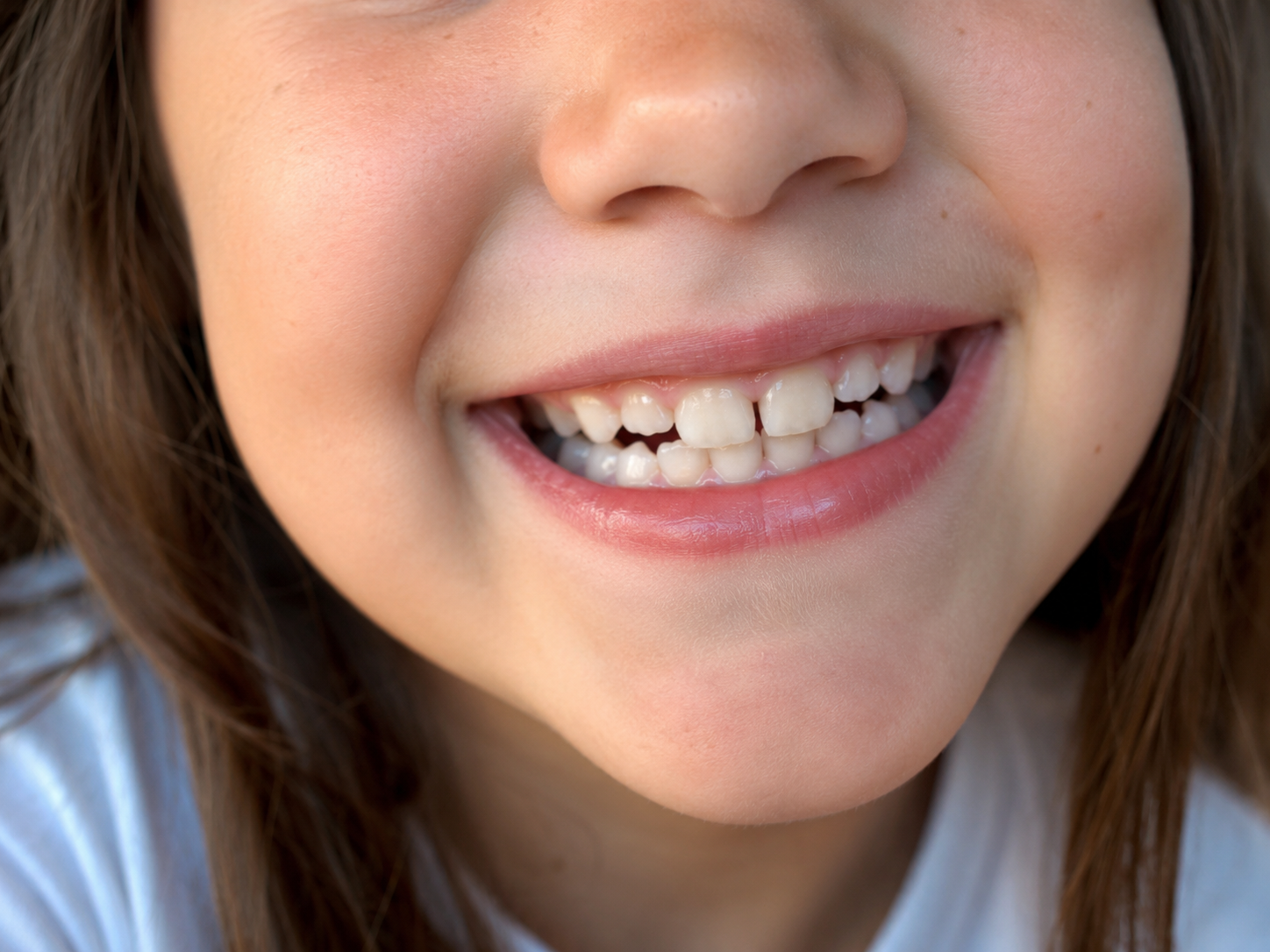Child’s Joyful Close-Up Smile
