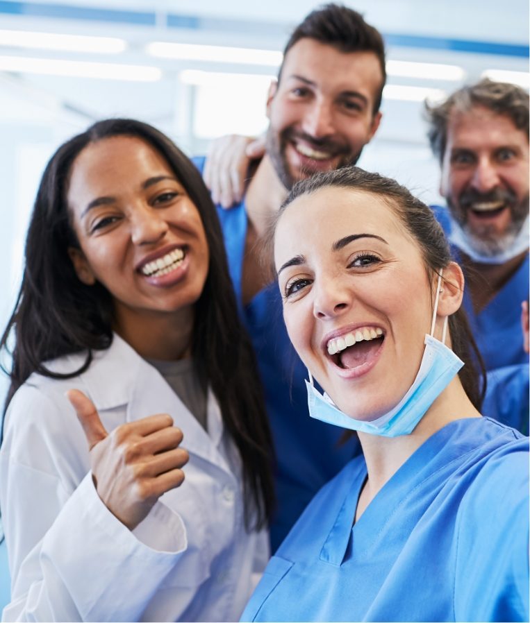 orthodontic team smiling