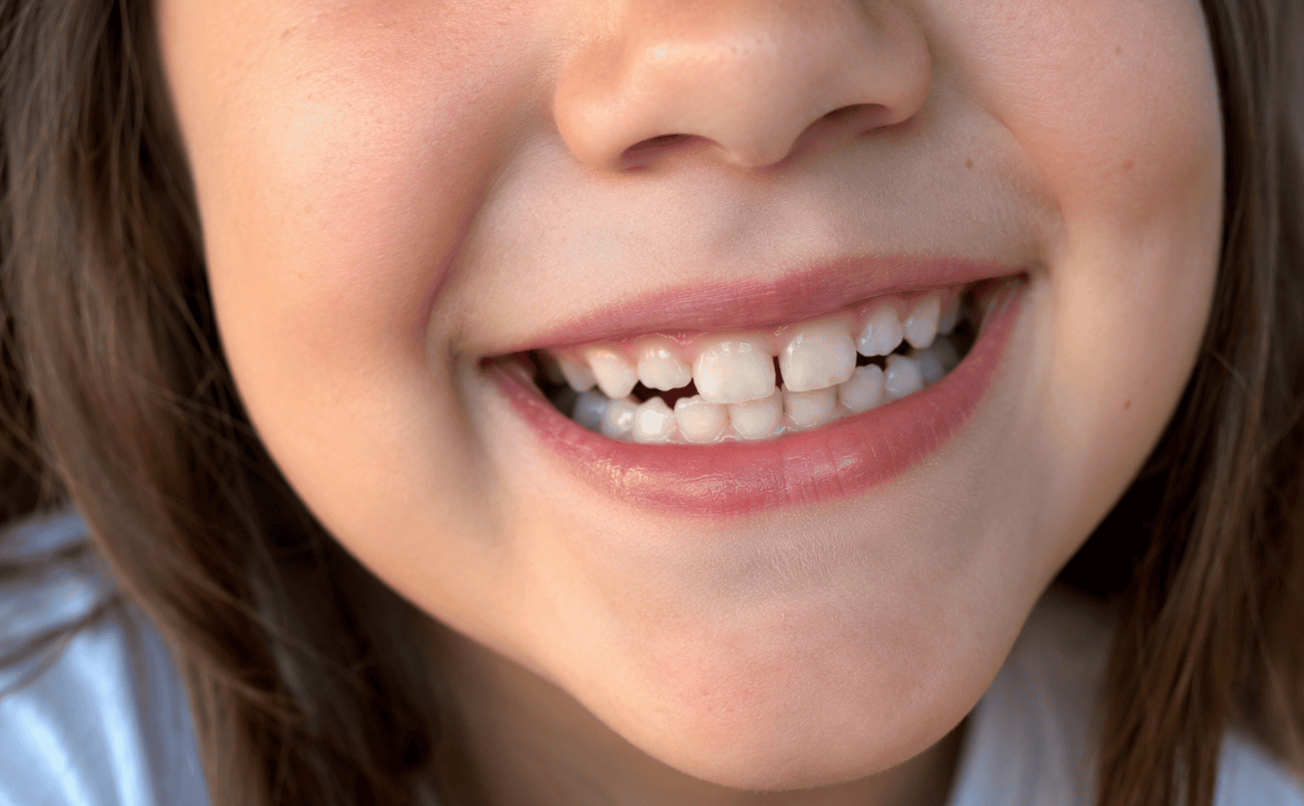 Child’s Joyful Close-Up Smile